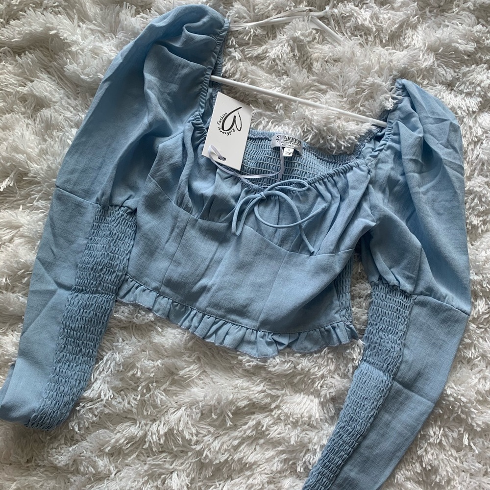 Verge girl blue top!